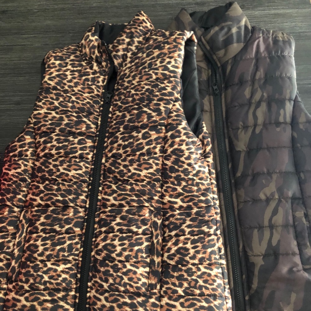 Medium Size Puffer Vests. Pre worn